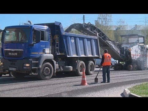 Асфальтоукладчики выходят в город